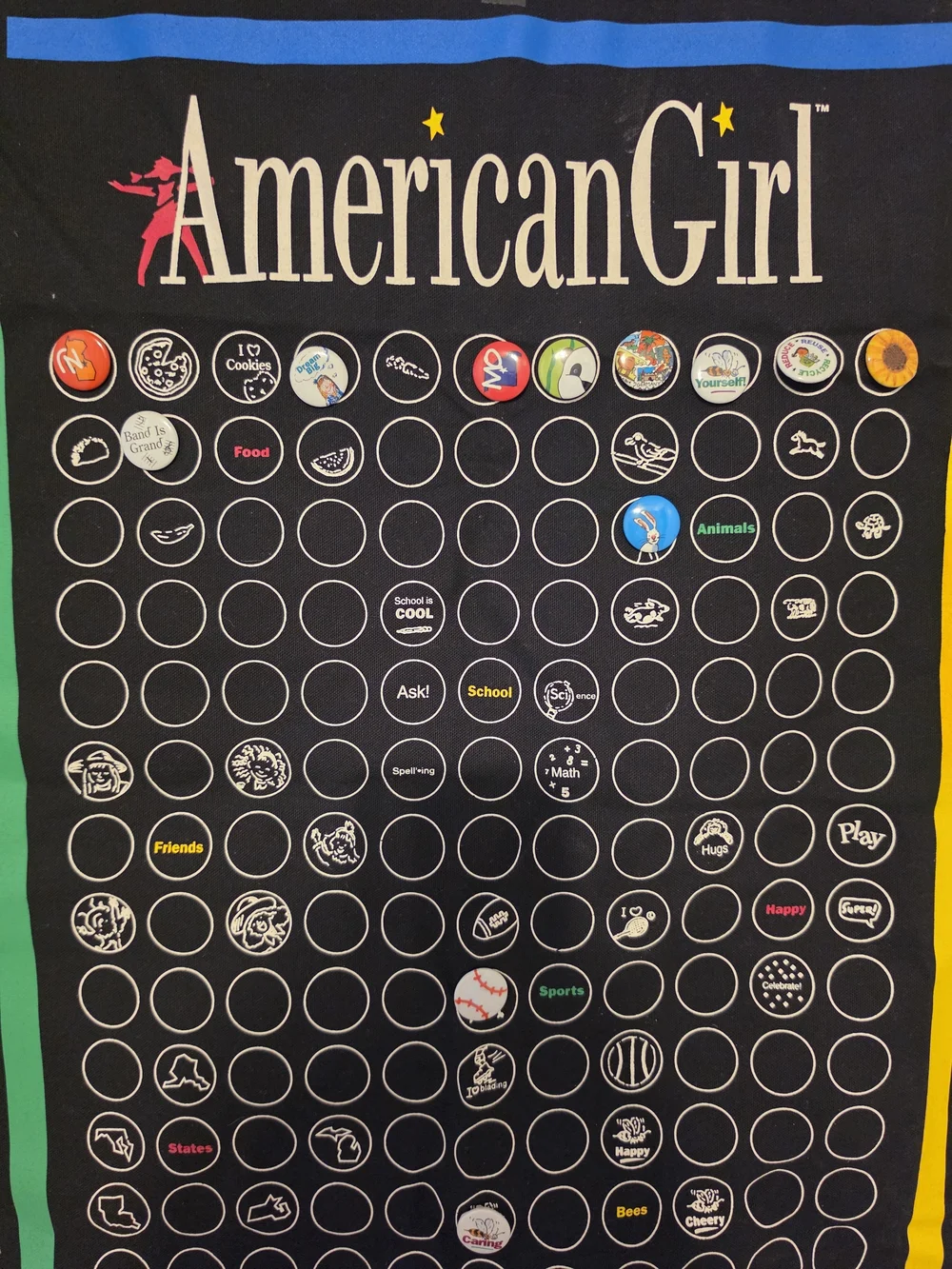 American Girl Black Grin Pins Display Banner with Green, Blue, Yellow Accents